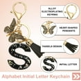 thumbnail image 3 of Llaveros de letra inicial del alfabeto Uxcell, llaveros lindos de resina con charm de colgante de letra S y borla de mariposa, 3 of 7
