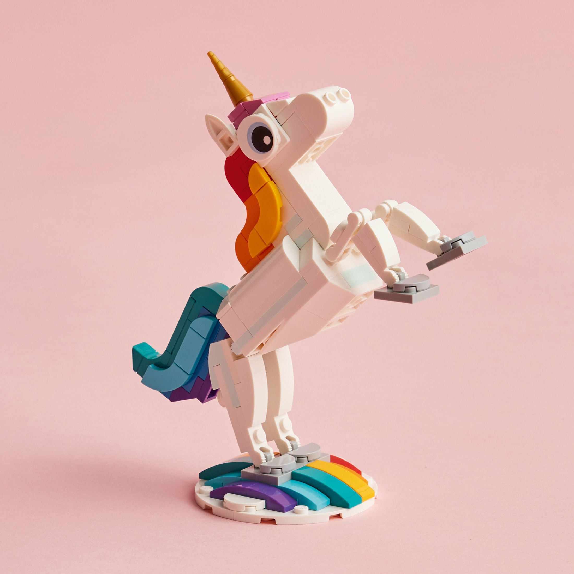 A little rainbow unicorn to brighten my day. I love the $10 creator sets.  This one can also be a seahorse and some kind of peacock/duck thing. :  r/lego