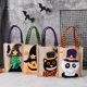 thumbnail image 1 of Taian Paquete de 4 bolsas de truco o trato de Halloween, 4 bolsas no tejidas reutilizables Goodie Candy Treat Bag para niños Favores de fiesta temáticos de Halloween (6.2 X 7.4), 1 of 2