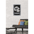 thumbnail image 2 of NFL Las Vegas Raiders - Neon Helmet 23 Wall Poster, 14.725" x 22.375" Framed, 2 of 5
