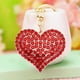 thumbnail image 4 of Llavero de Corazón y Melocotón para San Valentín | Llavero de Aleación con Forma de Corazón para Mochila, Bolso y Móvil | Regalo Romántico para Parejas | 9,5 X 4 Cm | Rosa, Rojo, Blanco, Dorado, 4 of 6