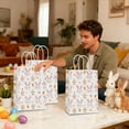 thumbnail image 4 of AURIGATE 12 Pcs Easter Gift Bag,Bunny Paper Treat Bags with Handles Easter Party Favor Pouches Spring Bunny Egg Candy Pouches for Kids Holiday Party Gift Wrapping, 4 of 6