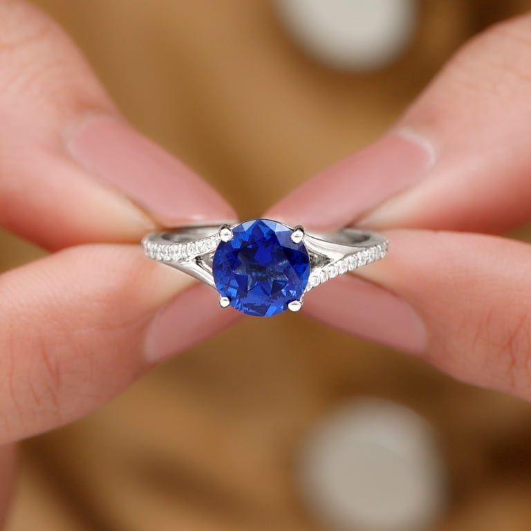 Sapphire engagement ring shop with diamond side stones