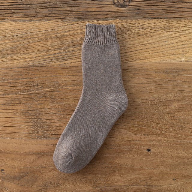 Calcetines gruesos y cálidos de otoño e invierno de color sólido hasta la mitad de la pantorrilla que absorben el sudor y son transpirables Calcetines del mismo estilo para hombres y mujeres