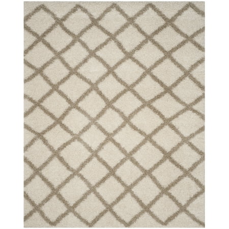 Safavieh SAFAVIEH Dallas Shag SGD258B Ivory / Beige Rug SAFAVIEH Dallas Shag SGD258B Ivory / Beige Rug Inspired by classic shag rugs in European homes  SAFAVIEH s Dallas Shag Collection is a stylish transitional floor covering that blends chic modern design with expert construction. Boasting a 2-inch pile height  this rug provides sink-in comfort underfoot while imbuing a sense of sumptuous relaxation. Rug has an approximate thickness of 1.5 inches. For over 100 years  SAFAVIEH has set the standard for finely crafted rugs and home furnishings. From coveted fresh and trendy designs to timeless heirloom-quality pieces  expressing your unique personal style has never been easier. Begin your rug  furniture  lighting  outdoor  and home decor search and discover over 100 000 SAFAVIEH products today.