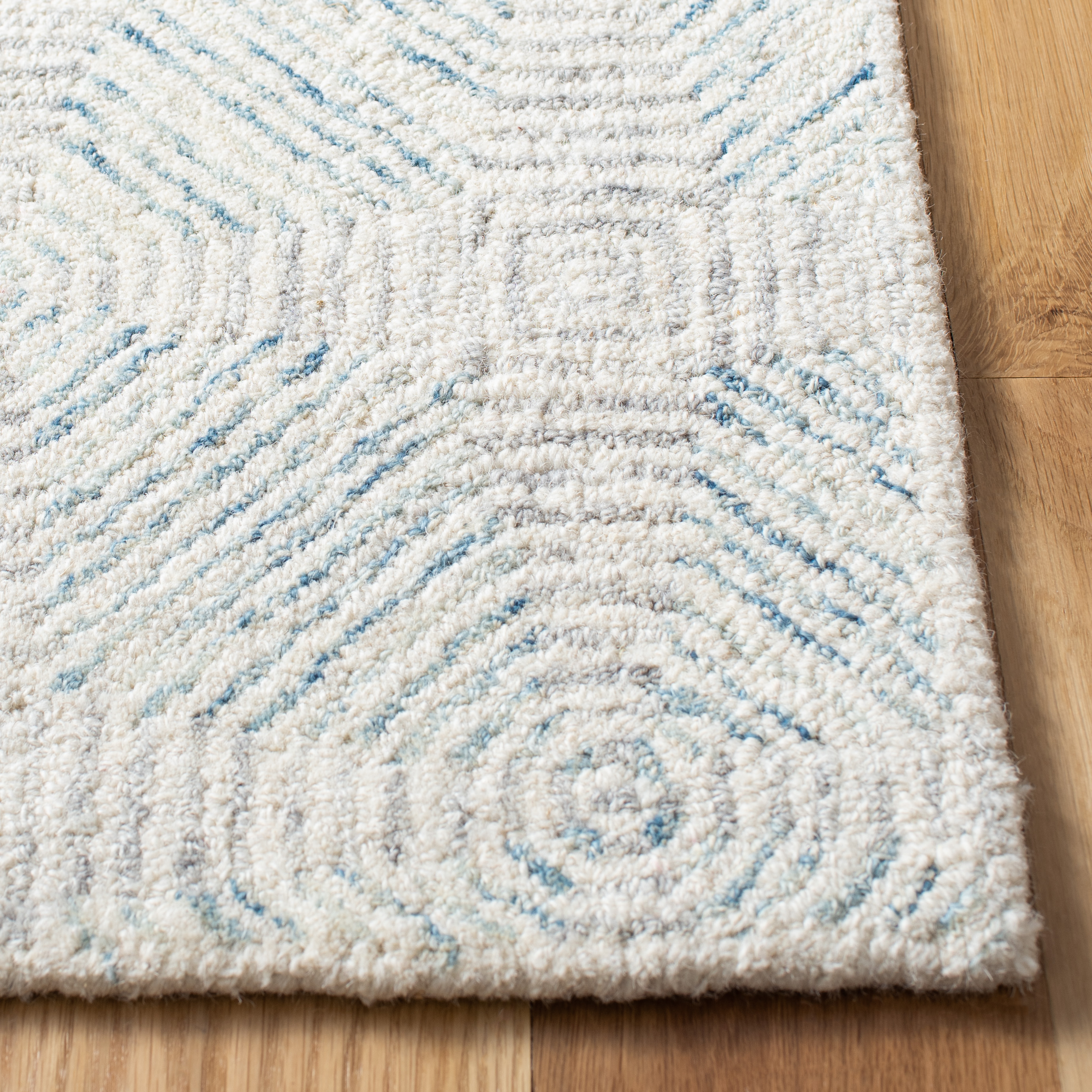 SAFAVIEH Abstract Qendro Geometric Area Rug, Ivory/Light Blue, 4' x 6'
