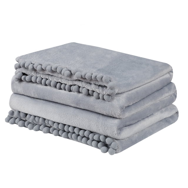 Franela Vellón Manta con Pompones Flecos, Suave Cálido Microfibra Sofá, Felpa 330GSM Livianas Decorativas Sólidas Mantas para Sofá Silla Gris 50 x 59