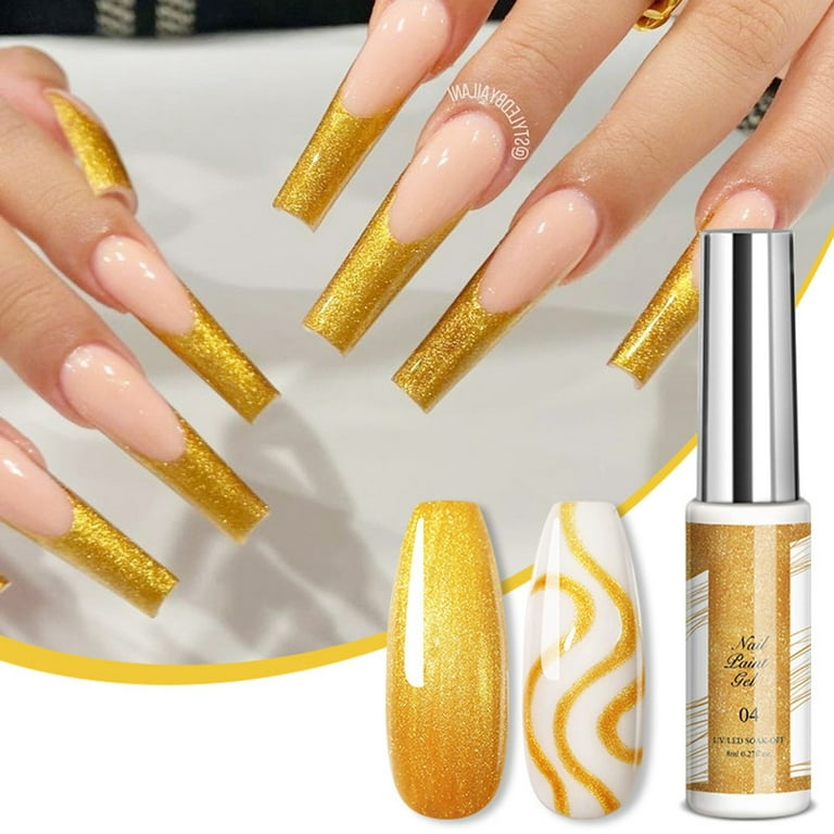 White nail polish with gold and silver rhinestones. White nail art !