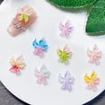 thumbnail image 2 of Colgantes para uñas UEYRSEDB, 80 unidades, 3D, con forma de flor hawaiana, hielo luminoso, 2 of 6