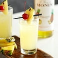 thumbnail image 5 of Monin - Pineapple Syrup, Enjoy Tangy Sweet Pineapple Aroma and Authentic, Fresh Squeezed Pineapple Juice Flavor. Great for, Cocktails, Smoothies, Sodas and Lemonades (750 ml, 25.4 fl.oz), 5 of 6
