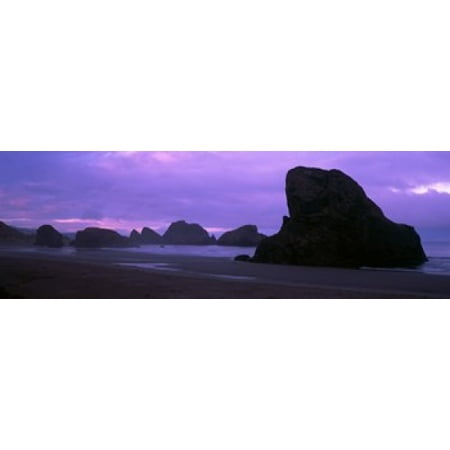 Silhouette of rock formations in the sea Myers Creek Beach Oregon USA Canvas Art - Panoramic Images (36 x