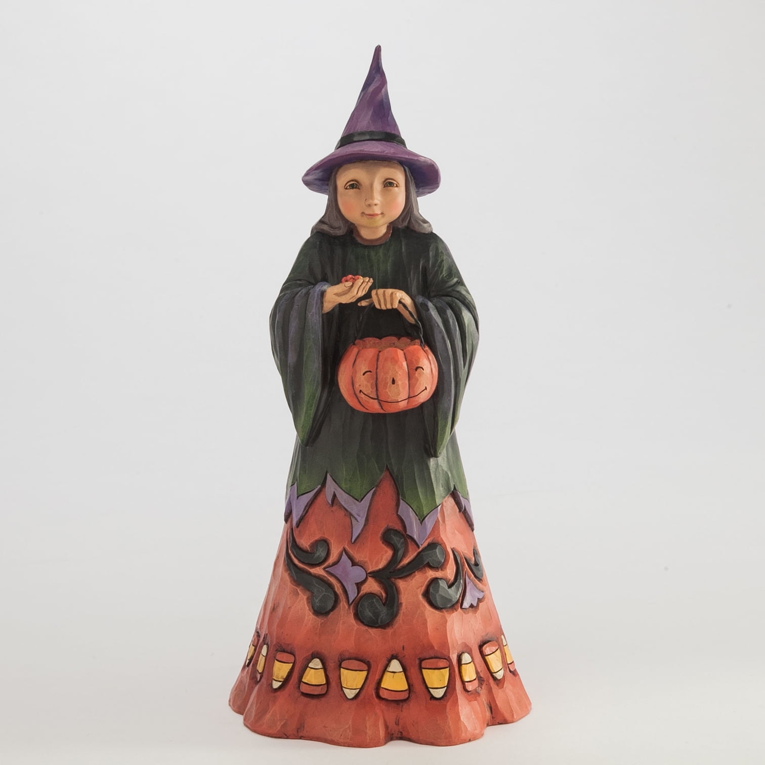 jim shore witch on pumpkin