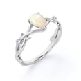 thumbnail image 4 of JeenMata Triple Stone 1 Carat Pear Shape White Opal And Moissanite Infinity Twisted Shank Engagement Ring In 18K White Gold Plating Over Silver, 4 of 7