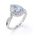 thumbnail image 4 of JeenMata Twisted Infinity 1.75 Carat Pear-Shaped Created Aquamarine and Moissanite Pave Double Halo Cluster Engagement Ring in 18K White Gold Plating over Silver, 4 of 6