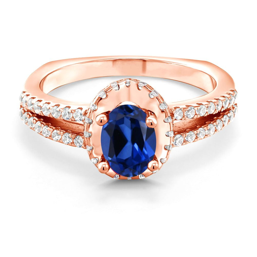 Gem Stone King 18K Rose Gold Plated Silver Blue Created Sapphire Engagement Ring for Women | 1.40 Cttw | Oval 7X5MM | Wedding Engagement Anniversary Promise Ring for Women| Size 9