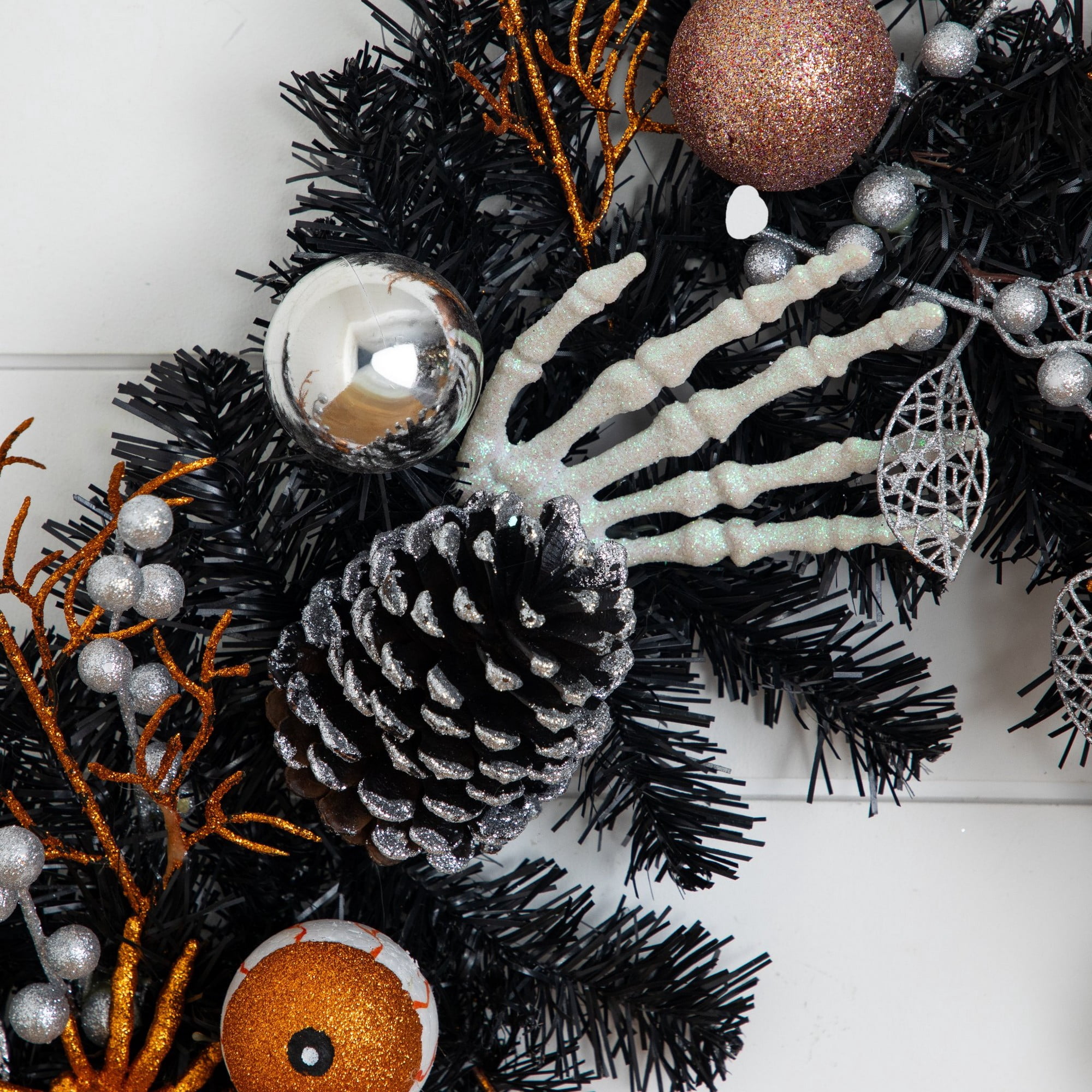 6ft. Artificial Halloween Black Garland with Hands, Spiders and Eyeballs