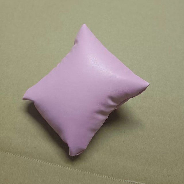 Caja de reloj, pequeña almohada, joyero, interior de franela, pequeña almohada, bolsa de almohada de cuero PU, exhibición de pulsera, bolsa de algodón de seda
