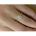 thumbnail image 3 of Solitaire Brilliance 1 Carat Oval Moissanite Engagement Ring with Space Pave in 18k Yellow Gold, Ring Size 10, 3 of 5