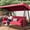 Burgundy, variant on CHINNLUU Oversized 4 Person Porch Swing with Stand 800 LBS Capacity Adjustable Canopy Backrest Includes Cushions Pillows Patio 2 in 1 Swing Bed for Backyard Garden Poolside, Burgundy