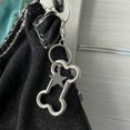 thumbnail image 5 of Llavero de coche con forma de estrella de cinco puntas y hueso de plata, pequeño, novedoso y con cierre de langosta, accesorio decorativo para bolso de estudiante., 5 of 5