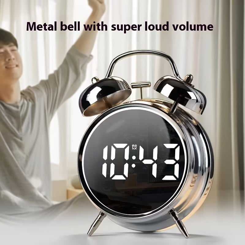 This is a stylish metal alarm clock with a night light and a variety of features, including temperature and date displays. It operates quietly without ticking and has both weekday and weekend alarm s
