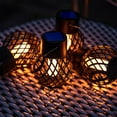 thumbnail image 6 of Outdoor Solar Hanging Flame Ball Lights Flickering LED Lanterns | 4-Pack Small Hollow Waterproof Decorative Pendants for Patio Garden Yard Tree Branch Ambiance Lighting, 6 of 9