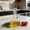 B, variant on Glass Oil and Vinegar Cruets Set of 2, 9oz Clear Glass Olive Oil Dispenser Bottles with Airtight Stoppers, Round Salad Dressing Containers