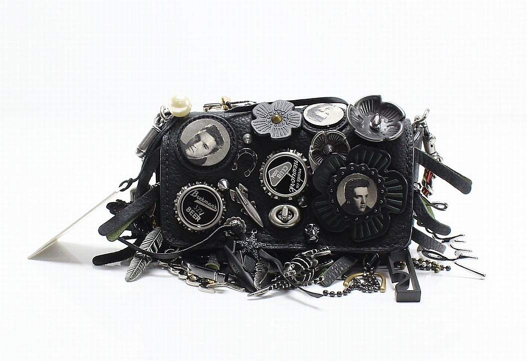 elvis coach purse