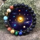 thumbnail image 4 of Nvzi Pulsera ajustable de cuentas de piedra natural con temática de ocho planetas del sistema solar Unquie, multicolor, 4 of 5