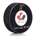 thumbnail image 1 of Logan Stankoven Signed Canada Hockey Puck with Jr Gold Note, 1 of 2