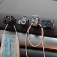thumbnail image 1 of Clips de cable de 4 piezas, clips de soporte de cable autoadhesivos fuertes en forma de cámara con sistema de gestión de flash y sonido JAMW Sencillez, 1 of 5