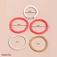 thumbnail image 4 of 5 juegos de pulseras bohemias con cuentas de madera elásticas para mujer Boho Tass, 4 of 4