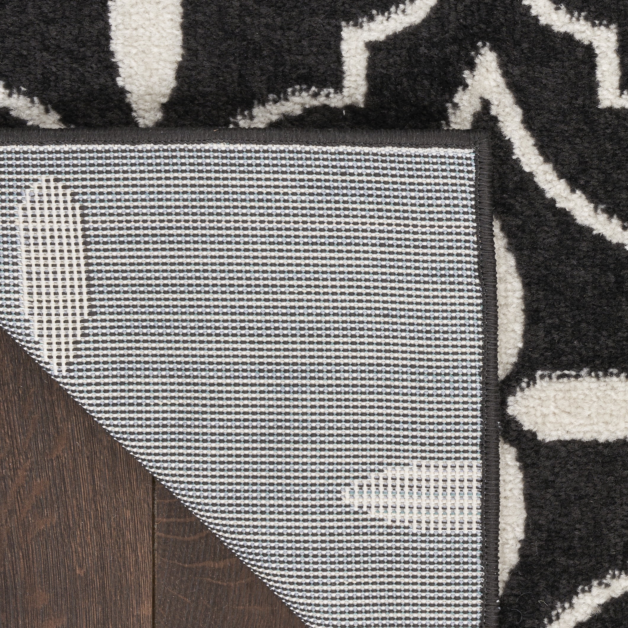Nourison Essentials Indoor/Outdoor Black Ivory 2'2" x 7'6" Area Rug (2x8)
