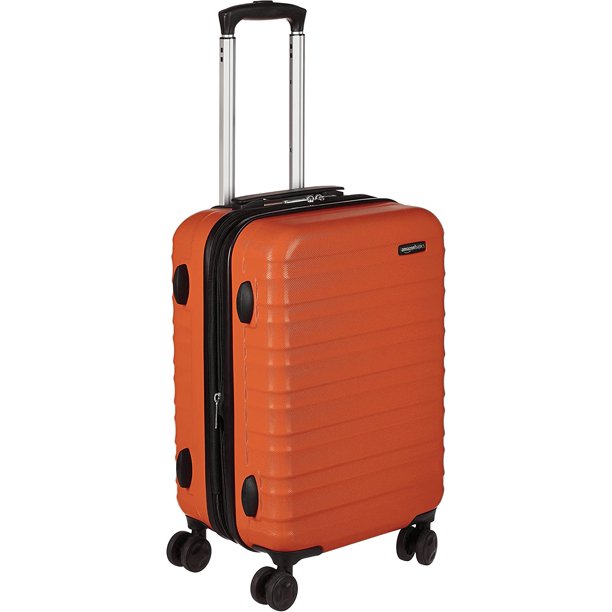 Basics Equipaje de mano rígido de 53,3 cm, maleta rígida con ruedas, ampliable para hasta un 25 % más de espacio, cuatro ruedas multidireccionales, naranja
