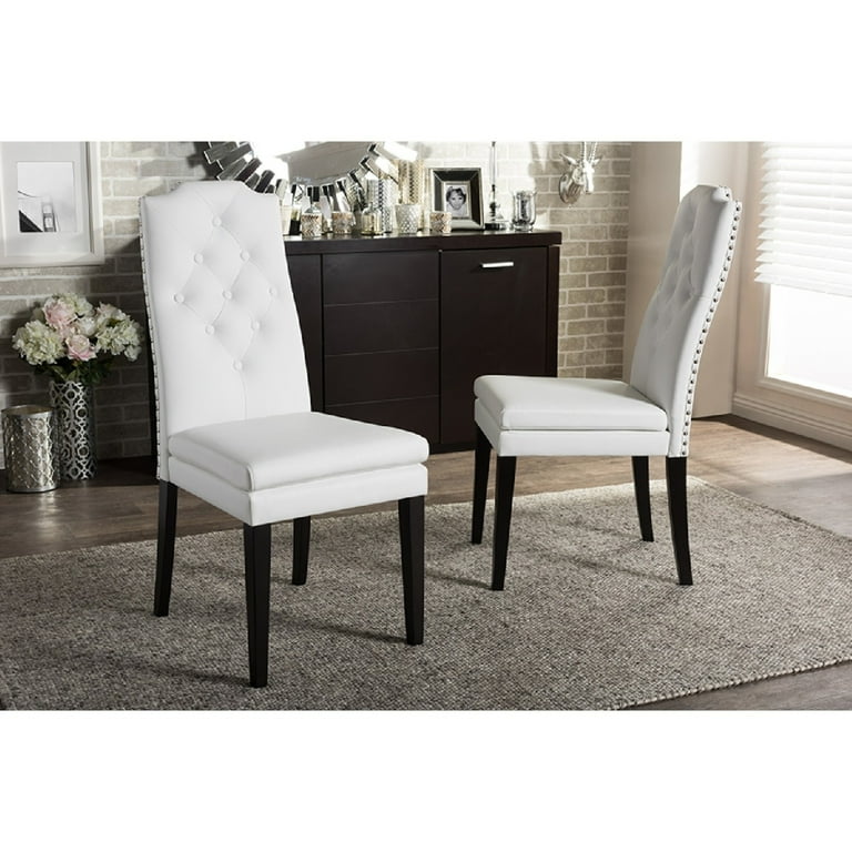 Baxton Studio Dylin Modern and Contemporary White Faux Leather Button-Tufted Nail heads Trim Dining Chair - Set of 2 Baxton Studio Dylin Modern and Contemporary White Faux Leather Button-Tufted Nail heads Trim Dining Chair - Set of 2