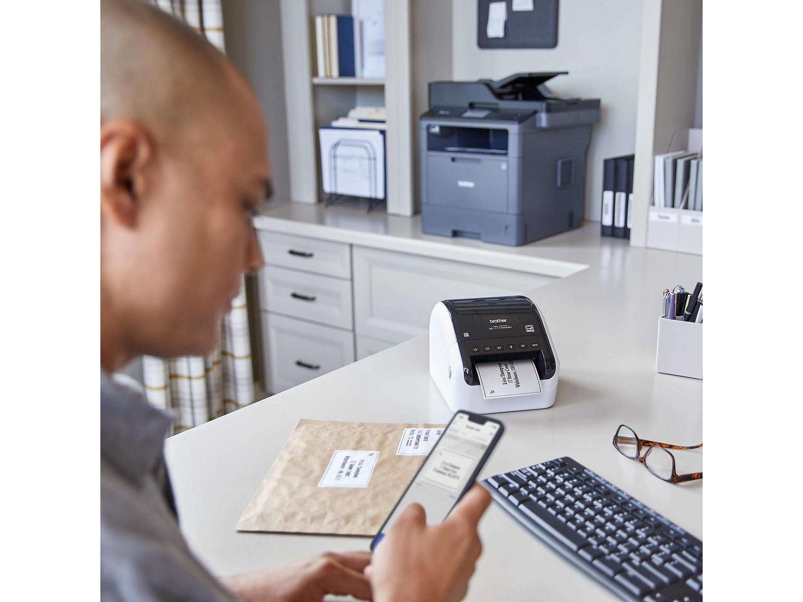 Brother QL-1110NWBc - Label printer - direct thermal - - 300 x 300 dpi - up to 69 labels/min - USB, LAN, Wi-Fi(n), Bluetooth 5.2 EDR - cutter - black, white