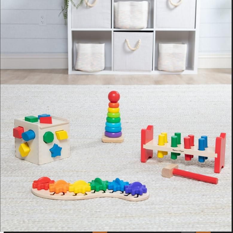 Melissa & Doug Rainbow Surprise Toys in a box