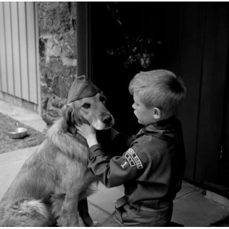 Boy scout in uniform with dog wearing scout hat Canvas Art - (18 x 24)