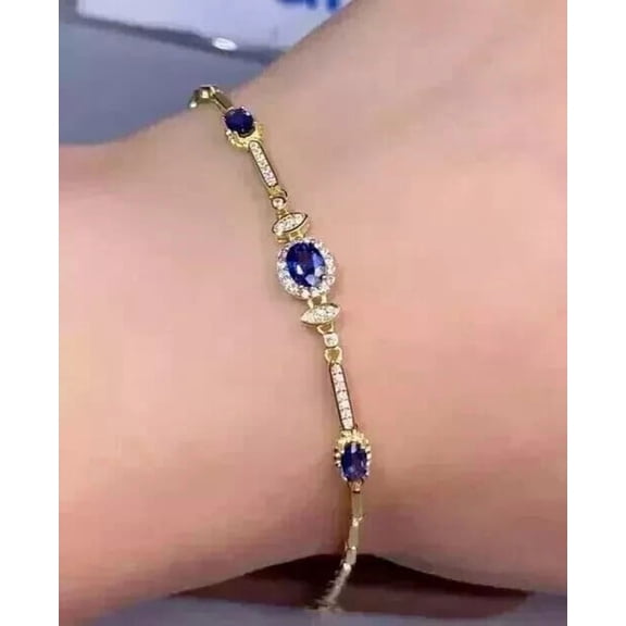 8Ct Oval Cut Lab-Created Sapphire Women's Tennis Bracelet 14K Yellow Gold Plated