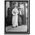 thumbnail image 2 of Historic Framed Print, [Unidentified woman at Mrs. W. Wilson, 1st breakfast] - 3, 17-7/8" x 21-7/8", 2 of 9