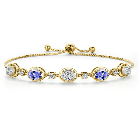 Gem Stone King 18K Yellow Gold Plated Silver White Lab Grown Diamond and Blue Tanzanite Bracelet for Women | 3.60 Cttw | Gemstone April Birthstone | Oval 7X5MM | Fully Adjustable 9 inch
