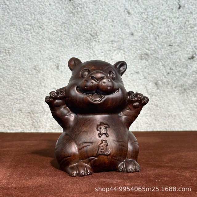 Ebony carved ornaments of the twelve Chinese zodiac animals: rat, ox, tiger, rabbit, dragon, snake, horse, sheep, monkey, rooster, dog, and pig.