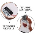 thumbnail image 4 of Los niños juegan ukelele de juguete, ukelele, juguete de aprendizaje, ukelele de aprendizaje, juguete de educación temprana, ukelele, guitarra, suministro para niños, ukelele para principiantes, 4 of 7