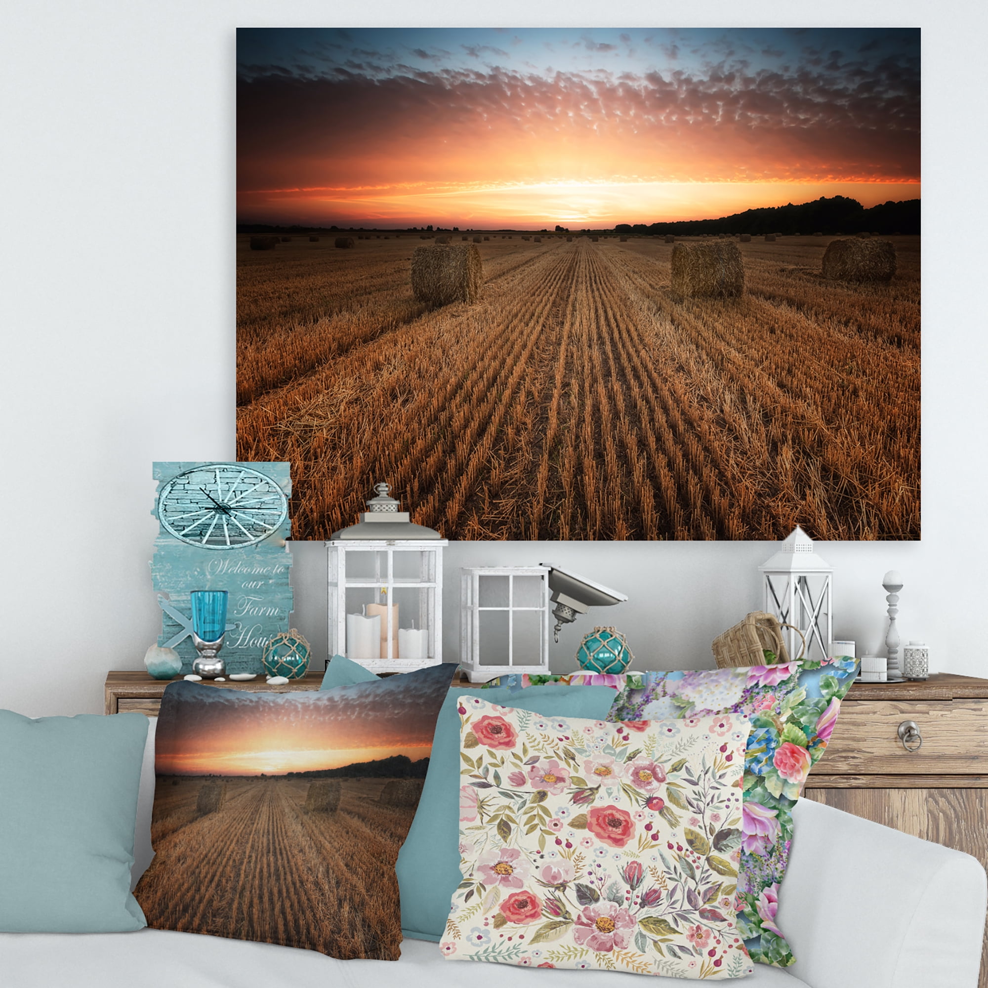 A Field Full of Hay Bales At Sunset Landscape 32 in x 16 in Photography Canvas Art Print, by Designart