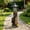 Brown + Resin + Art Deco, variant on FENGFAN Solar Powered Black Bear Welcome Garden Statue Two Bear Cubs Hand Painted Weather Resistant Resin 19 Inch 1 Pack