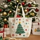 thumbnail image 4 of Bolsa de Lona con Manzanas para Nochebuena con Regalos de Papá Noel, 4 of 6
