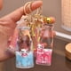 thumbnail image 3 of Llavero personalizado personalizado de Hello Kitty, botella de leche acrílica, líquido que fluye, llavero de arena movediza, colgante de líquido móvil, 3 of 4