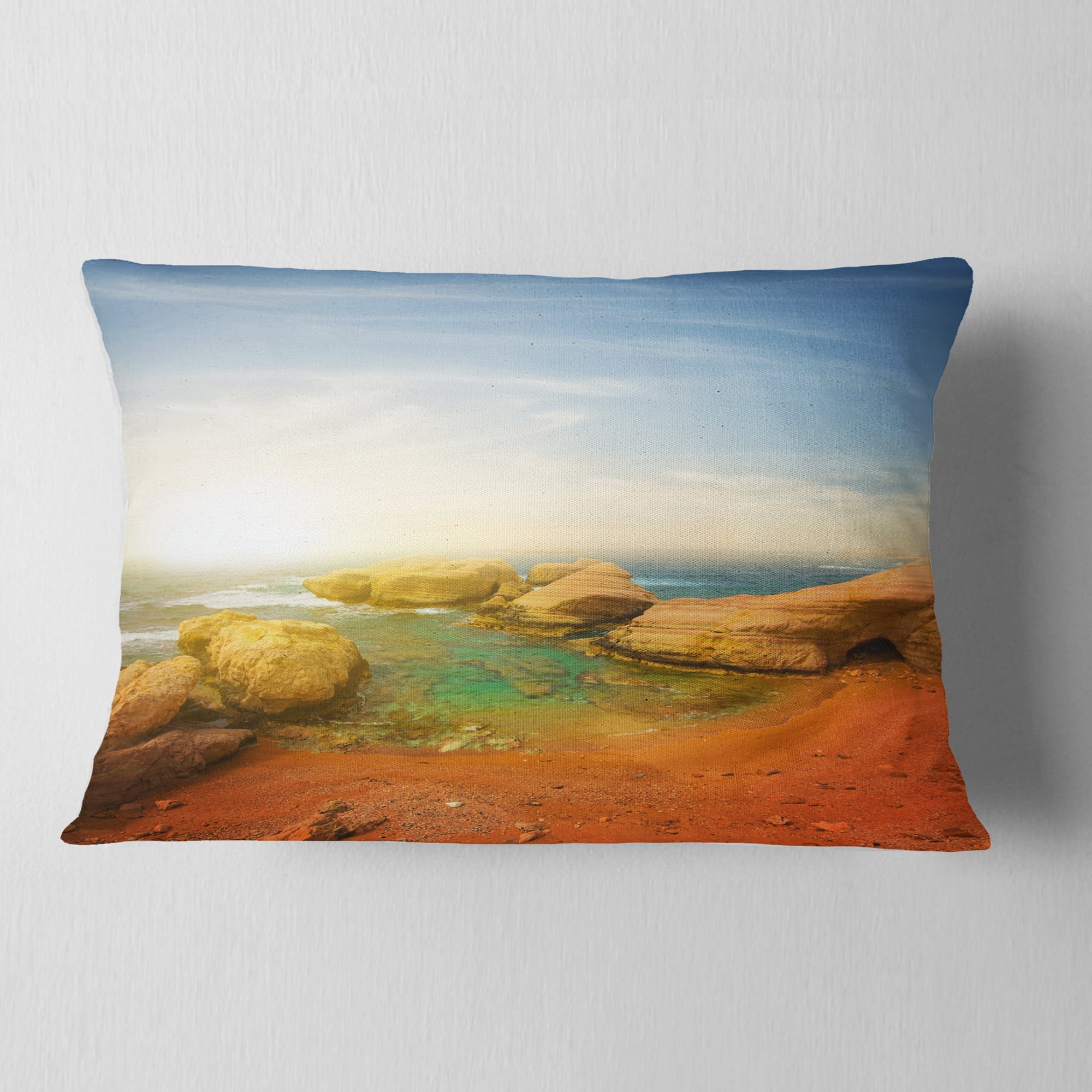 Designart Rocky Red Beach and Blue Sky - Seashore Throw Pillow - 12x20