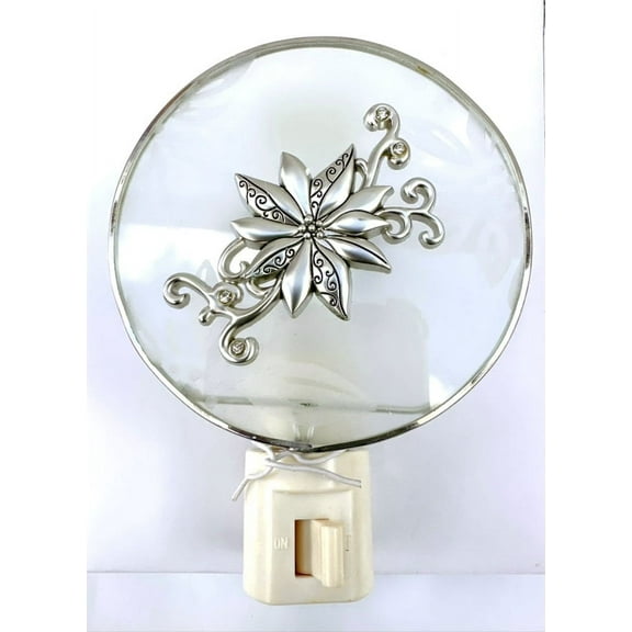 Metal flower on frosting winter window night light