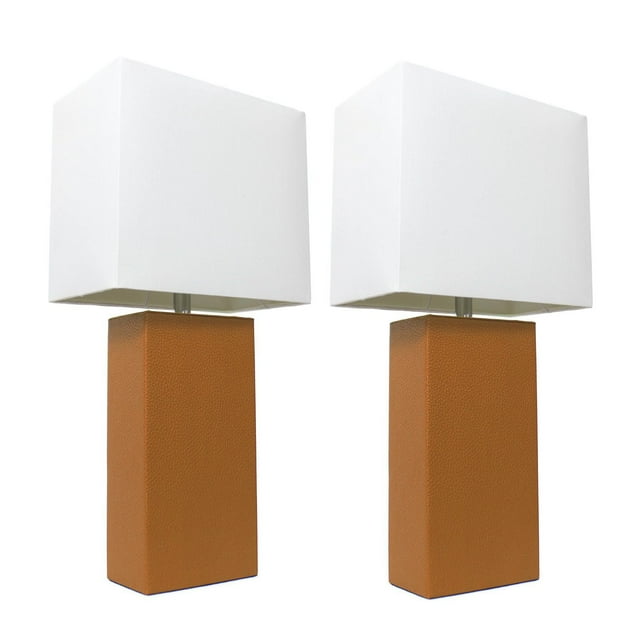Pair of modern table lamps featuring rectangular brown leather bases and white fabric shades for elegant home decor.